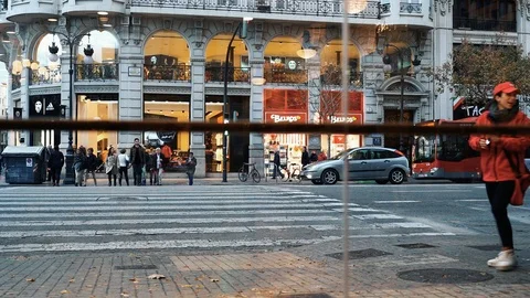 View trough a glass. People passing by  the window. City life. S&amp;M Stock Footage 106302201