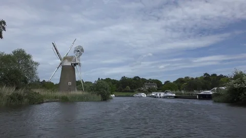 View of Turf Fen Drainage Mill on the river Ant - driving POV Stock Footage 84806269