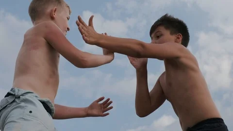 A view of two boys, figting on a training outdoors Stock Footage 93151807