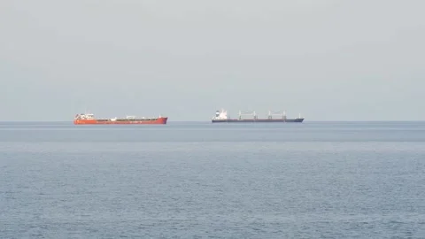 View of two cargo ships carrying goods b... | Stock Video | Pond5