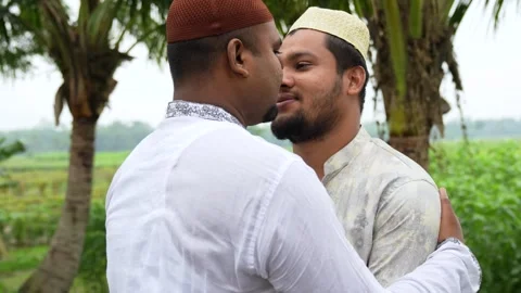 View of two Muslim men hugging during Eid in Bogura, Bangladesh. 스톡 동영상 334991929