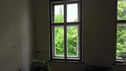 View of two old wooden windows and parquet flooring. Concept of an old house Stock Footage 310642105