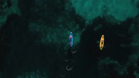 View of two rowing on green sea Stock-Footage 244626081