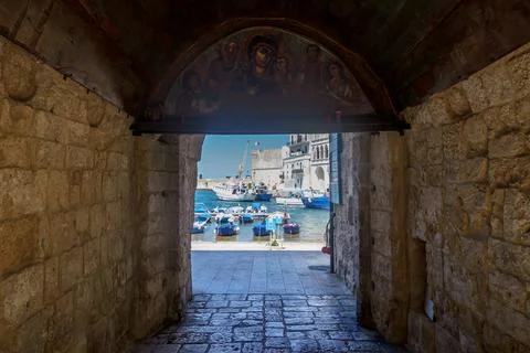 View of a typical access to the old port of Monopoli, Italy, Apulia Stock Photos