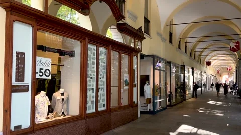 View of typical arcades under historic building in Asti, Italy Stock Footage 282400984