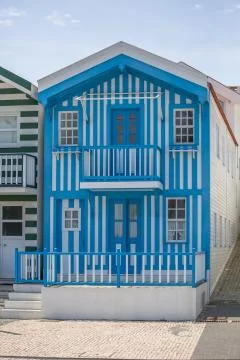View of typical Costa Nova beach house, colorful striped wooden beach houses Stock Photos