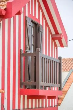 View of typical Costa Nova beach house, colorful striped wooden beach houses Stock Photos
