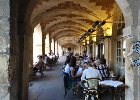 View of typical French cafe Place Royalel in the quarter Marais, the historic Stock Photos