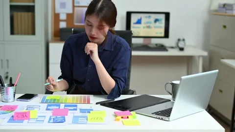 View of UI developer team brainstorming on their project with laptop, smart.. Video stock 312849379