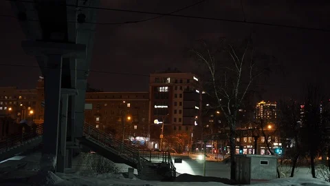 View from under the bridge to the night street. Novosibirsk, Siberia. Video stock 122227264