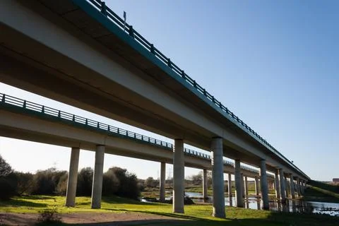 View from under the bridge over the Tietar river as it passes through La Baza Stock Photos