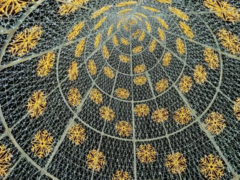 View from under a Christmas tree made of lights 库存照片