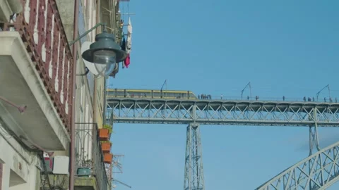 View under Dom Luís I Bridge iron structure Stock Footage 327688485