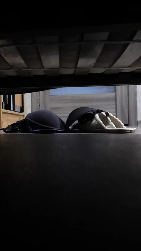 View from under wobbly bed where couple makes love. Man and woman have sex. Stock Footage 326903592