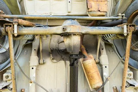 View of the undercarriage (underside) .rusty old car, bottom view. Stock Photos