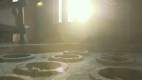 View of underground cellar for storing georgian wine in kvevri Stock Footage 238535796