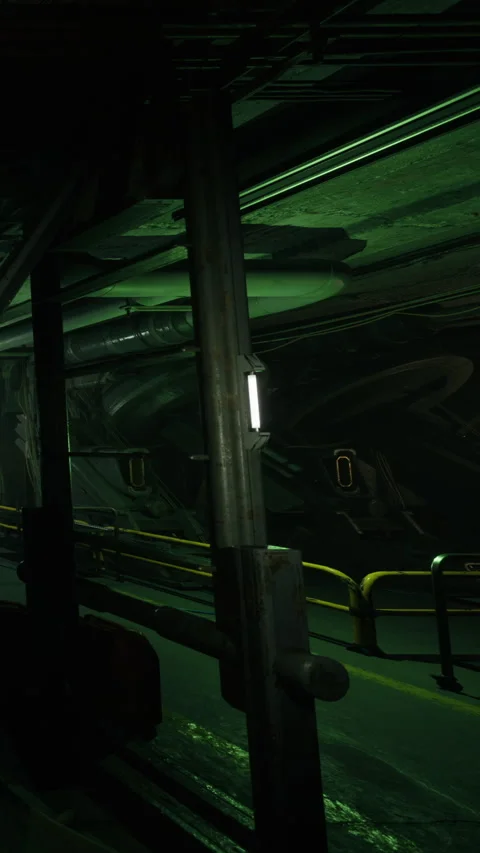 View of an underground tunnel with green lighting and industrial elements Stock Footage 339952584