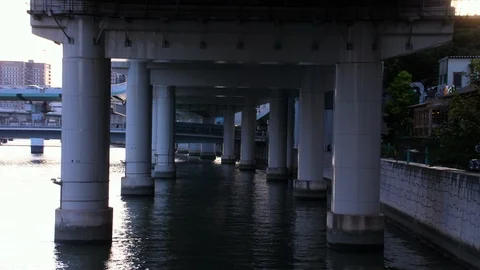 View Underneath Highway Bridge Aji River - Osaka, Japan Stock Footage 95413099