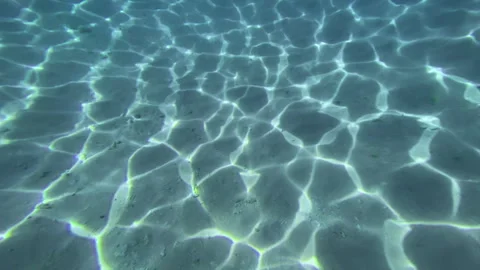 View of an underwater sand and light reflection Stock Footage 276163988