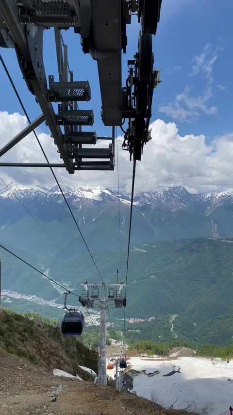 View of undulating hills and steep cliffs from cable car Stock Footage 277686542