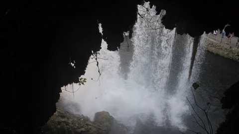 View of the Upper Duden Falls from cave behind waterfall, Antalya, Turkey Stock Footage 112711558
