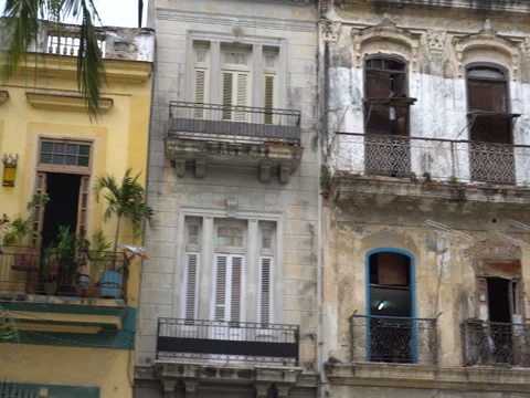 View to upper floors of old high-rise colonial buildings in Havana Stock Footage 71142518