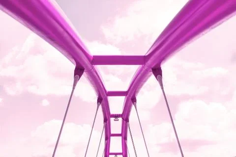 View of the upper structure of the fuchsia bridge against the pink sky. Stock Photos