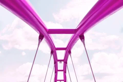 View of the upper structure of the fuchsia bridge against the blue sky. Stock Photos