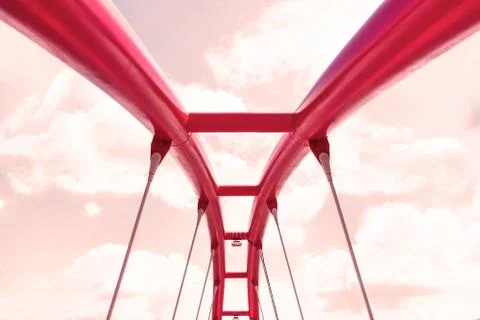 View of the upper structure of the red bridge against the pink sky. Stock Photos