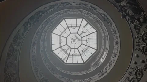 View upwards of the skylight above the Spiral Bramante Staircase Stock Footage 346641231