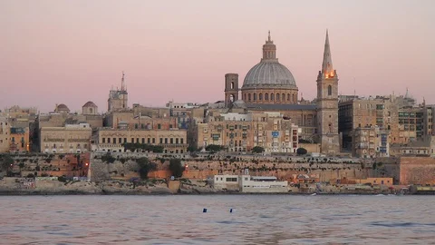 View on Valletta  Cathedral and belltower of Charmelite Church from Sliema em Stock Footage 88982777