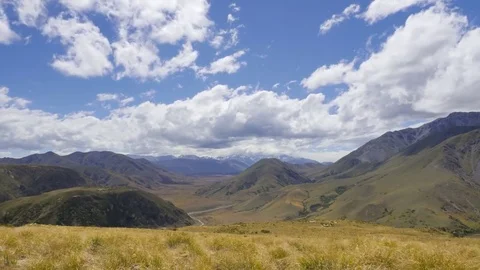 View on the valley of Edoras (LOTR), Mt Somers and southern Alps New Zealand Stock Footage 82651386