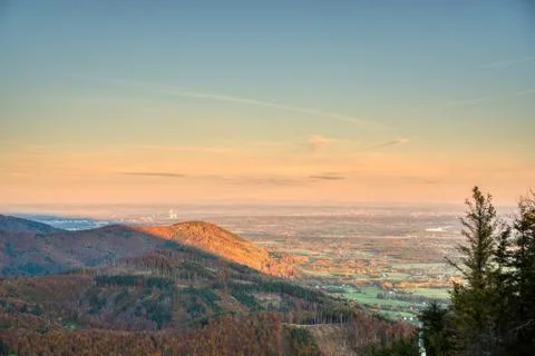 View of a valley full of industry  that smokes and house from the mountain at Stock Photos