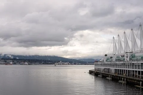 View of Vancouver Harbour under cloudy sky. Stock Photos