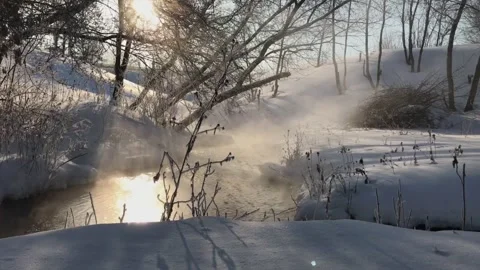 View of the vapors over the river on a winter morning in the village. Stock Footage 170487388