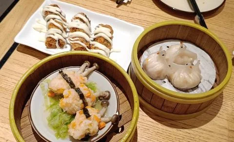 View of various dim sum in various shapes and mouth-watering aromas Stock Photos