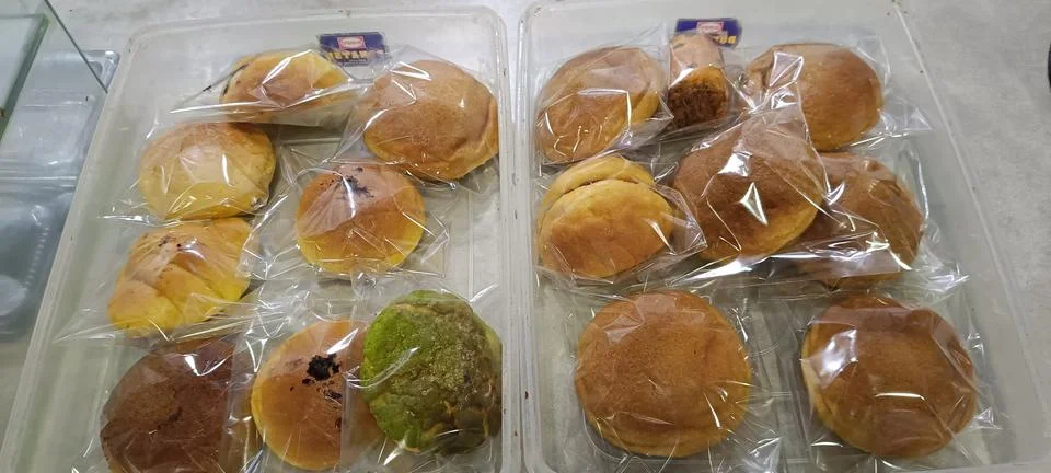 View of various pumpkin bread in the clear box Stock Photos