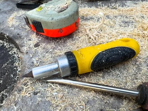 View of various tools on wooden table in workshop Stock Photos