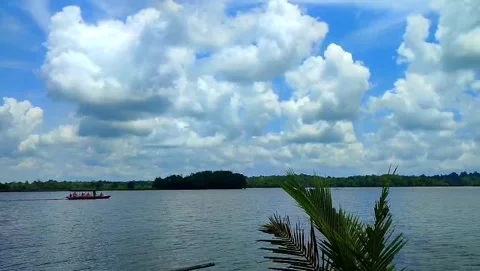 A view of a vast expanse of water under a bright Stock Footage 343196478