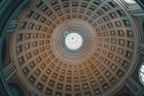 View of Vatican decorated ceiling dome. Round geometric ceiling with window Stock Photos