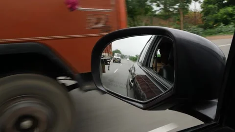 View of vehicles in side mirror of car Stock Footage 156953989