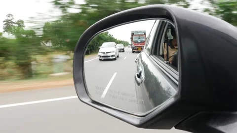 View of vehicles in side mirror of car Stock Footage 156954057