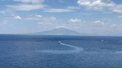 View of Vesuvius volcano and ferries from the observation deck in Sorrento Stock Footage 276948321