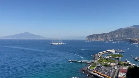 View of Vesuvius volcano and ferries from the observation deck in Sorrento Stock Footage 280638396