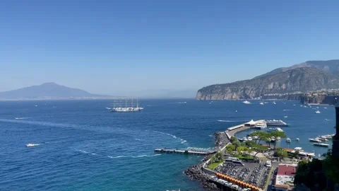 View of Vesuvius volcano and ferries from the observation deck in Sorrento Stock Footage 289045172