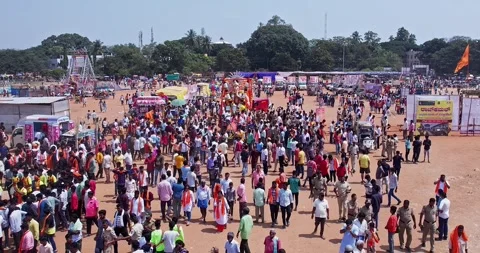 A view of a vibrant religious procession with a large Ganesha idol draws a .. Stock Footage 340084377