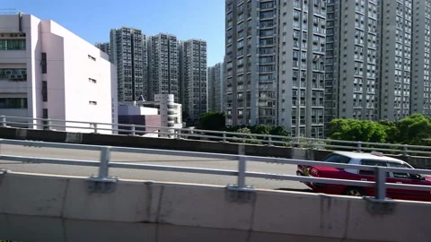 View of Victoria Harbour while riding on bus along Kwun Tong Bypass Part AC Stock Footage 226383308