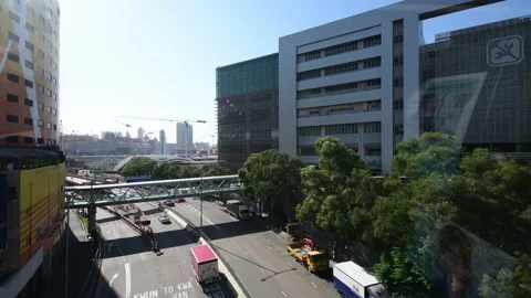 View of Victoria Harbour while riding on bus along Kwun Tong Bypass Part CC Stock Footage 226385310