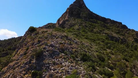 View of View of mountain peak and slope with grass Stock Footage 241515528