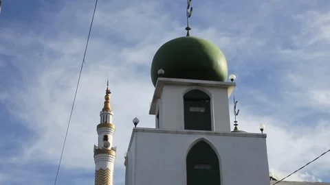 View of village mosque building with cloudy blue sky background Video stock 307353795